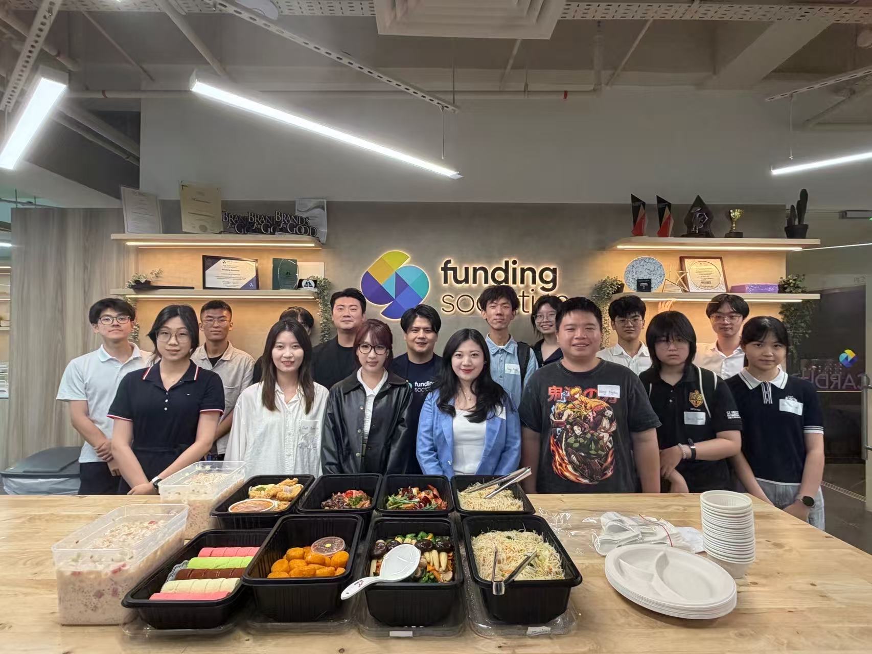 Students visiting a company and learning with the team